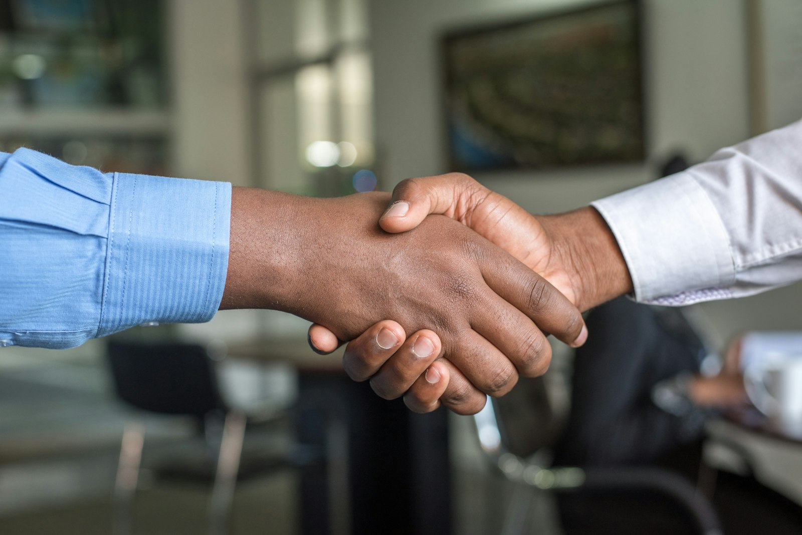 A business meeting in progress in a corporate office
